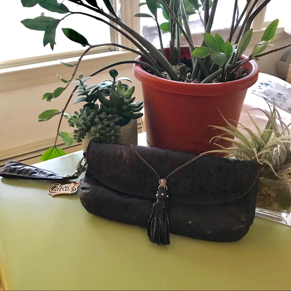 CARLOS SANTANA plum tassel clutch w/zipper detail